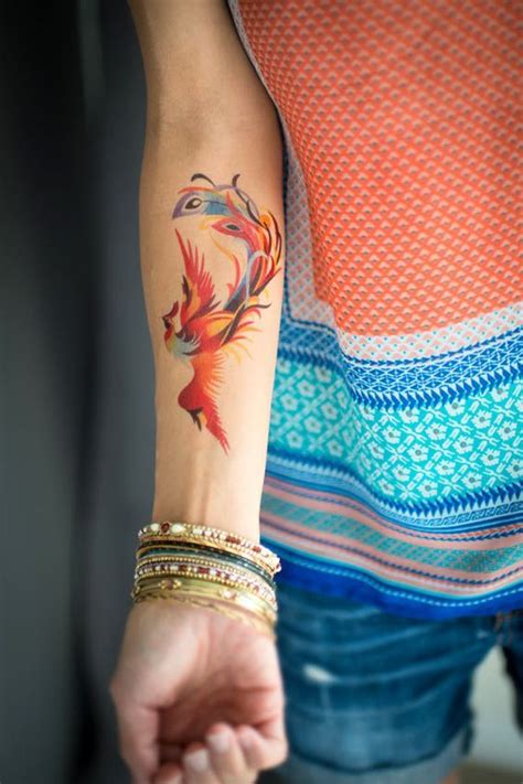 Cute Colorful Phoenix Tattoo On Forearm Phoenix Tattoo Design