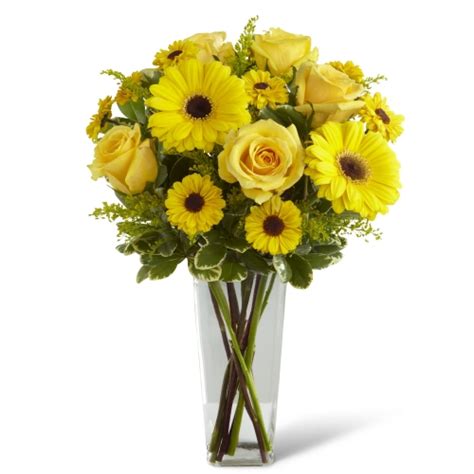 Fill a vase with fresh water and flower food. Yellow Flowers in a Glass Vase | Toronto Flower Delivery