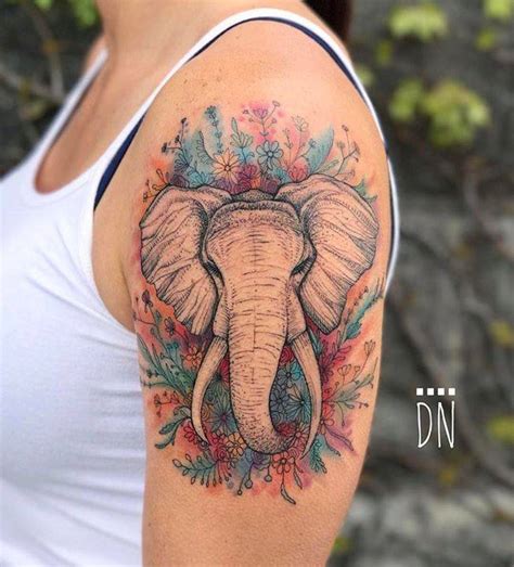 Elephant Tattoo On The Left Upper Arm