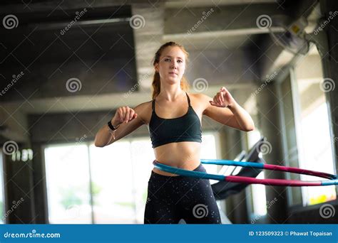 Beautiful Caucasian Young Woman Doing Hula Hoop In Step Waist Hooping Forward Stance Young