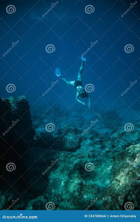 Underwater Shooting Girl Dives Underwater Freediving In A Black