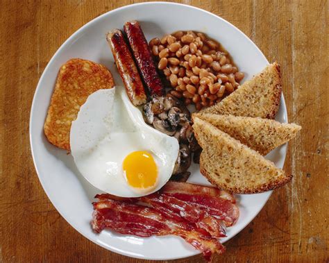 A full breakfast is a substantial cooked breakfast meal, often served in the united kingdom and ireland, that typically includes bacon, sausages, eggs, black pudding, baked beans. Homemade Mega-Breakfast: Sausage, Hash Brown, Bacon, Toast, Beans, Mushrooms, Fried Egg. : food