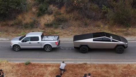 Tesla Cybertruck Tows Ford F 150 Up A Hill In Tug Of War Video Gear