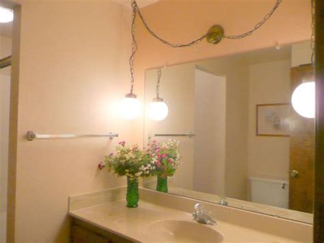 Tips for installing vanity lights in your bathroom. Light fixture upgrade on a budget | Hometalk