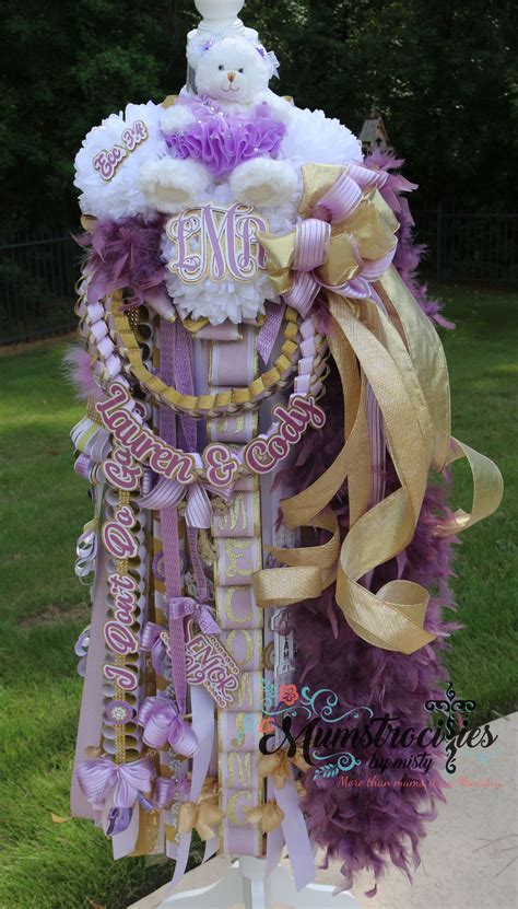 Homecoming Mum White And Gold With Purple Accents Texas Traditions Feathers Bling And Glitz