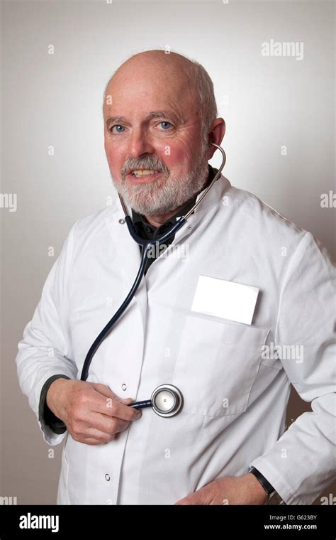 Doctor Physician With A Stethoscope Wearing A White Coat Stock Photo