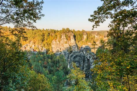 Elbe Sandstone Mountains In Autumn With Rock Formations In The Evening