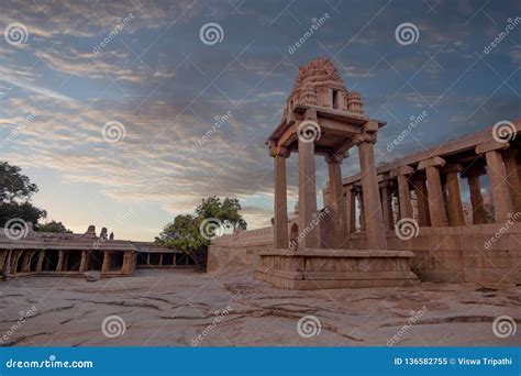 Pillars Of A Hindu Temple With Beautiful Sky And Cloud Backdrop Shiva