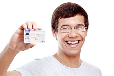 12000 Showing Id Card Stock Photos Pictures And Royalty Free Images