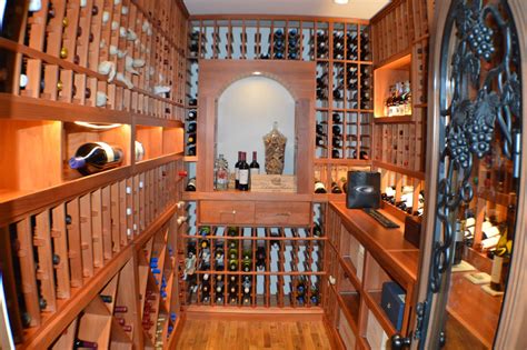 The main reason to build a wine collection is to take full advantage of a wine's ageing capacity. San Francisco Home Custom Wine Cellar with Redwood Racking
