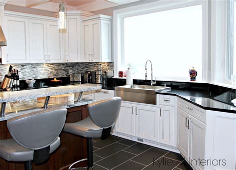 Feb 11, 2020 · most decisions in life aren't black and white, but designing a kitchen can be. White and gray marble island with black granite ...