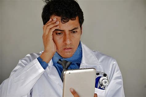 Shocked Adult Male Doctor With Tablet Stock Image Image Of Shock Computer