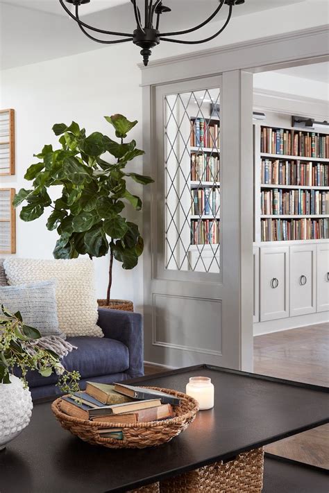 How To Decorate A Living Room With Front Door In The Middle Leadersrooms