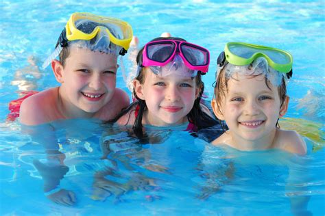 Cómo Y Cuándo Enseñar A Los Niños A Nadar