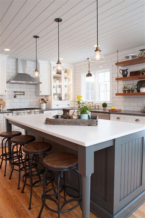 Farmhouse Kitchen With Shiplap Plank Ceiling And Beadboard Island