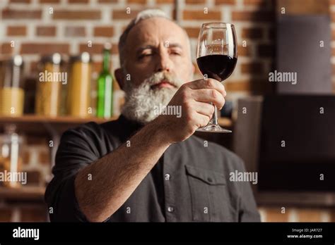 Man Holding Wine Glass Stock Photo Alamy