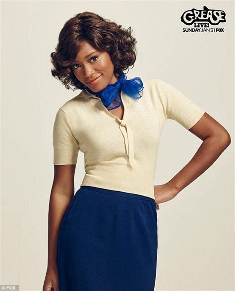 A Woman With Her Hands On Her Hips Wearing A Blue Bow Tie Around Her Neck