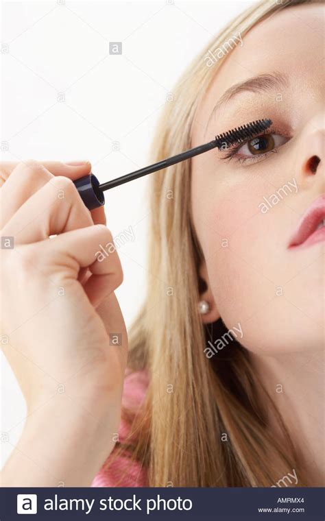 Girl Applying Mascara Hi Res Stock Photography And Images Alamy