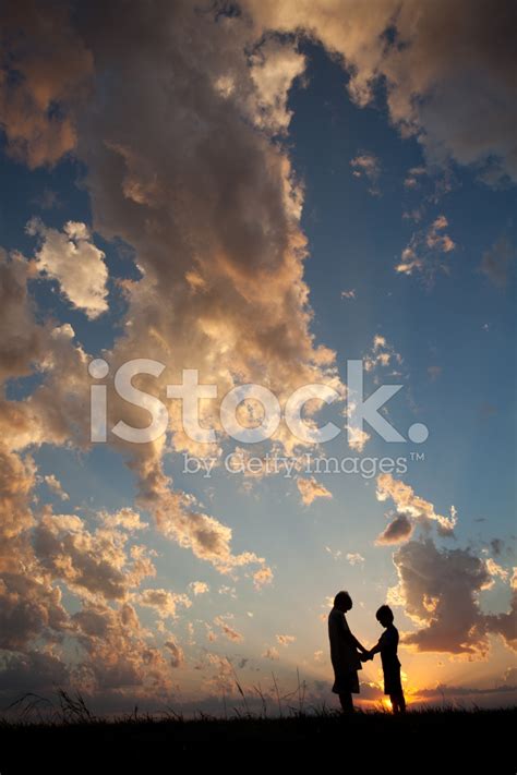 Silhouette Of Two Young Boys Praying Stock Photo Royalty Free