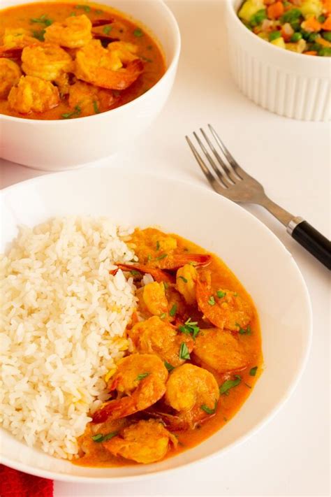 Thai red curry paste has typical ingredients like lemongrass, galangal, shrimp paste, shallots, cilantro root,red chilies and spices like coriander, cumin, fennel black pepper seeds turmeric root. Shrimp Curry with Coconut and Rice by celebratingflavors ...