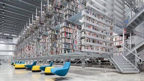 wolfgang tschapeller adds floating bookshelves to cornell university library