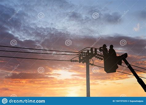 Silhouette Maintenance Of Electricians Work With High Voltage Stock