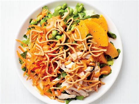 It is a tantalizing combination of napa cabbage, snow peas, carrots, bell peppers, mandarin oranges, sliced almonds, wonton strips and sesame seeds. Asian Chicken Salad with Peanut Dressing Recipe | Food ...