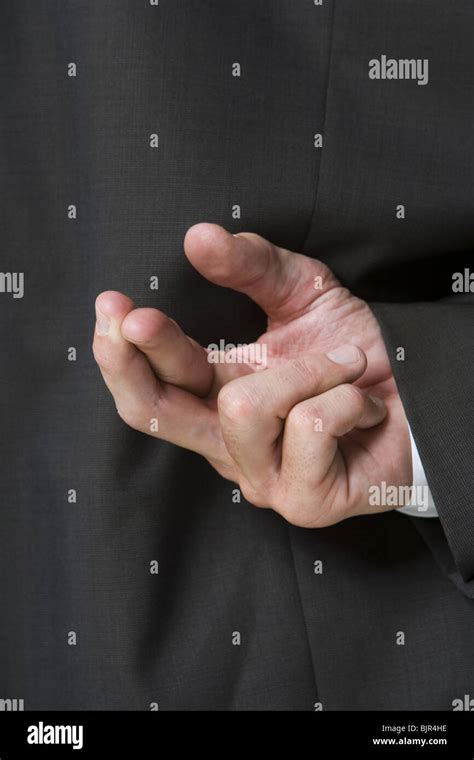 Lying Fingers Crossed Behind Back Hi Res Stock Photography And Images Alamy