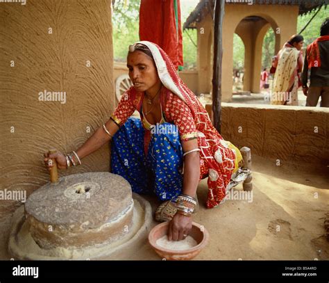 Grindstone Woman Flour Hi Res Stock Photography And Images Alamy