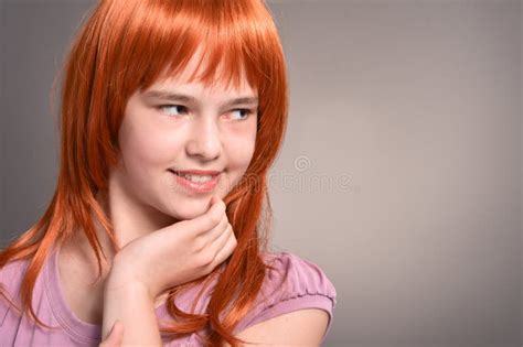 Close Up Portrait Of Cute Girl With Red Hair Posing Stock Photo Image