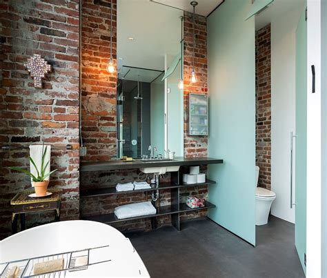 Brick walls look lovely anywhere in the house, even in the bathroom! Rugged and Ravishing: 25 Bathrooms with Brick Walls