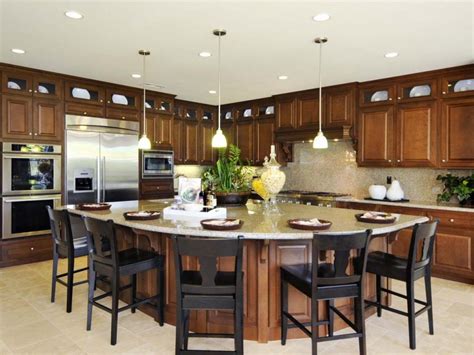 For a detailed look at kitchen island designs, countertop materials, dimensions, and additional features, check out our guide on buying a kitchen island. 21 Splendid Kitchen Island Ideas