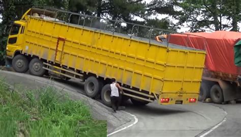 A Truck Driver In Difficulty On A Slope Road With A Steep Turn Canvids