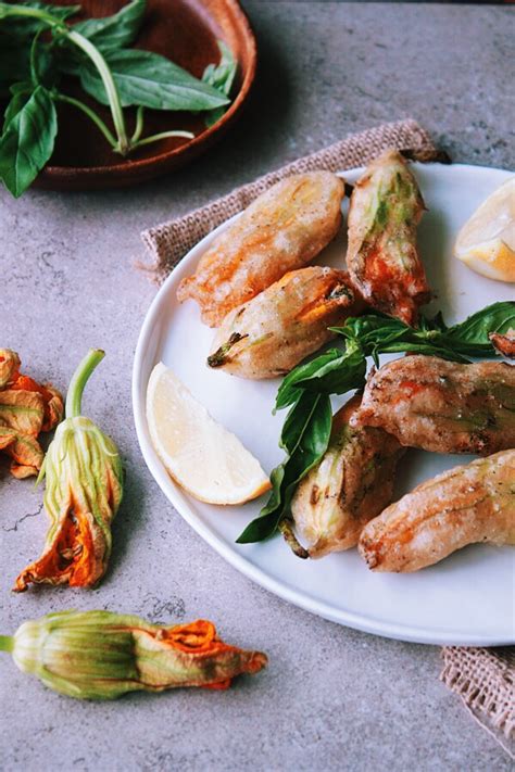 The flower is (literally) the flower that grows on the zucchini plant. Fried Zucchini Blossoms Stuffed with Basil Ricotta - A ...