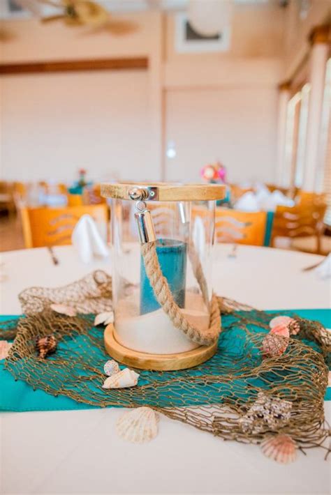 Contact a professional wedding planner today. 54 Amazing Beach Wedding Centerpieces - Weddingomania