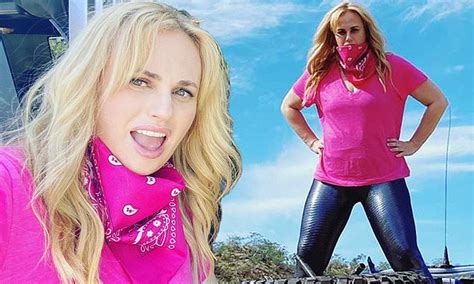 Rebel Wilson Shows Off Her Slimmed Down Figure Posing On Top Of A Dune