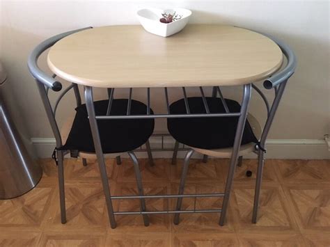 Space saving table and chairs.i wonder if you could build these with frame, foam and cover. Small table and 2 chairs | in Basingstoke, Hampshire | Gumtree