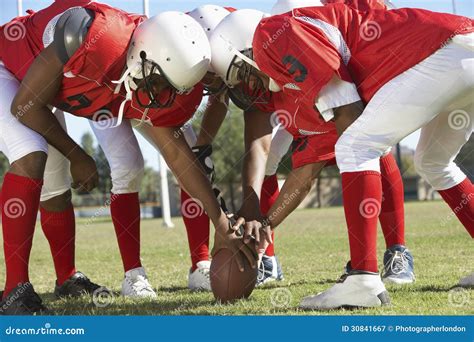 Players In Huddle Around Football Stock Image Image Of People