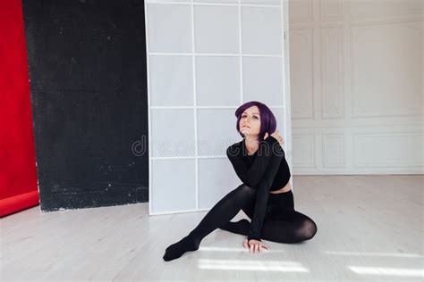 Portrait Of A Beautiful Girl Cosplayer Anime With Purple Hair Stock