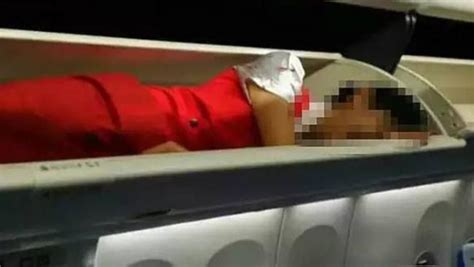 Female Flight Attendants Forced Into Overhead Luggage Compartments In