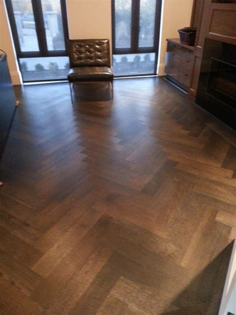 Maybe you would like to learn more about one of these? White Oak Herringbone hardwood floor