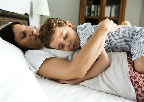 Boy Sleeping On Mothers Chest Premium Image By Sick