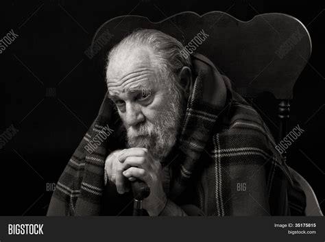 Sad Old Man Sitting Alone Lost Image And Photo Bigstock