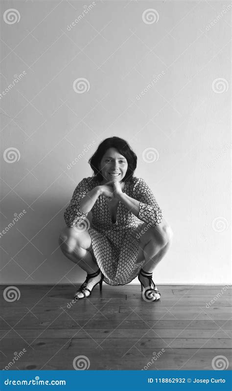 Woman Sitting Squatting In Front Of Ura Wall Stock Photo Image Of