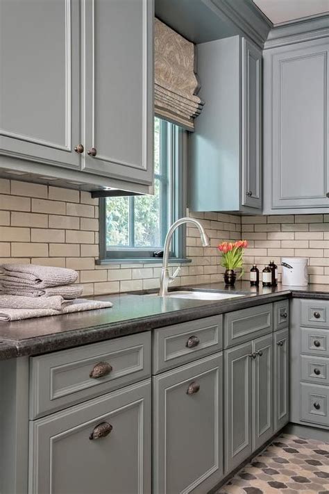 Quality cabinets & online convenience White and gray laundry room with honed black granite ...