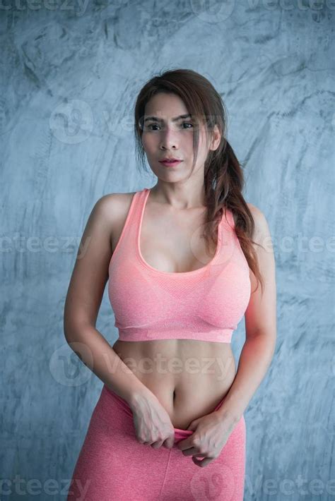 Close Up Asian Beautiful Sport Girl On Wall Of Gym Thailand Love Health