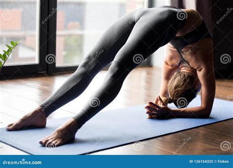 Young Sporty Fit Woman Doing Yoga Sun Salutation Surya Namaskar Royalty