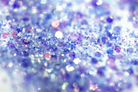 Blue Pink Sparkling Glitter On White Background Bokeh Abstract Close Up