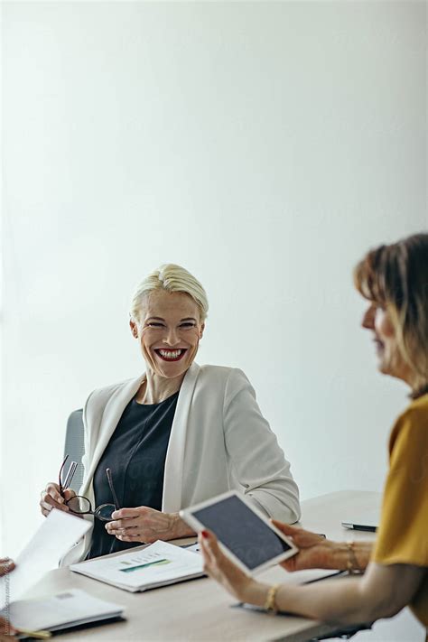 happy businesswoman smiling by stocksy contributor lumina stocksy