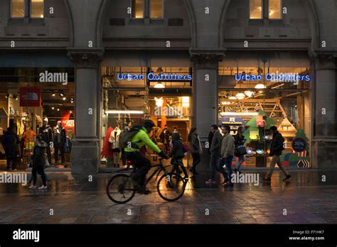 Glasgow Scotland Uk Urban Outfitters Shop And Cyclist Wearing High
